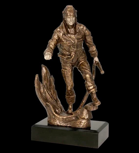 Cast figurine - firefighter