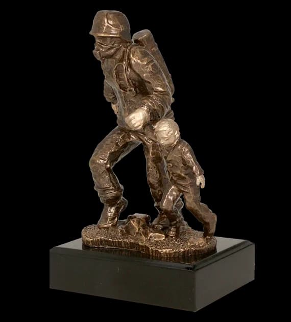 Cast figurine - firefighter