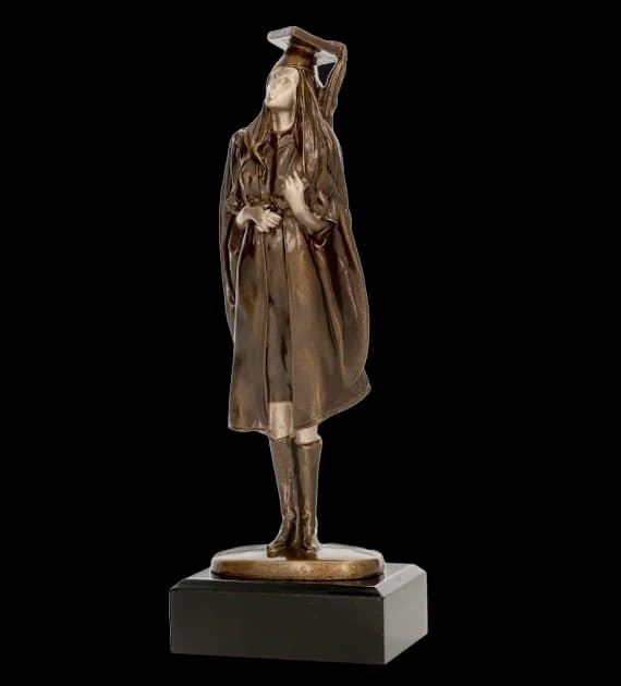 Cast figurine - female graduate - learning