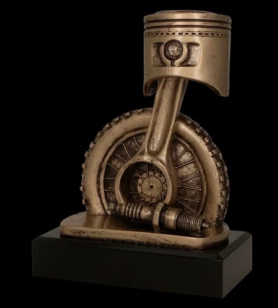 Cast figurine - motoring